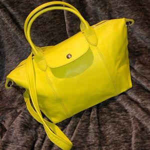 Longchamp le pliage cuir  small
Yellow in colour